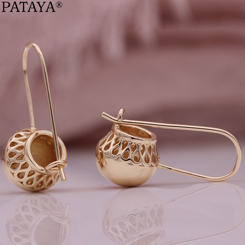 Customized wholesale of small spherical hollowed-out earrings with rose golden surface from Jia Mu Fashion, creativity and exaggeration detail image 1