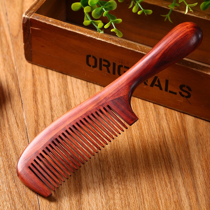 This high-end small-leaf rosewood comb with a thickened round handle offers an excellent feel. It is the top choice for a massage and straightening hair comb as a gift or for home use