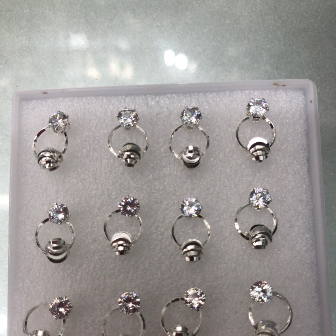 Ten or so running bead pop earrings