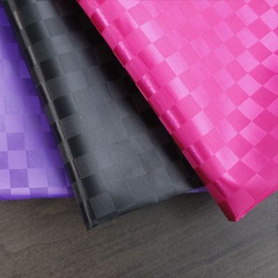 Special offer new product factory direct sales jacquard water Cube dyed polyester fabric cosmetic bag fabric in stock supply Item Picture