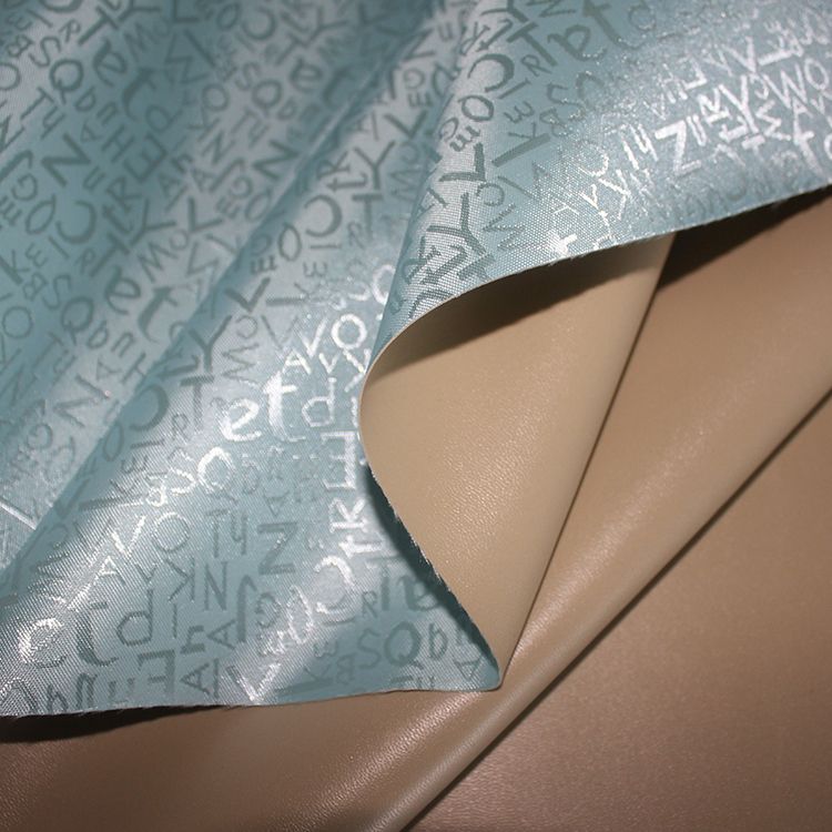 2020 tela de tela de poliéster tela de equipaje tela de impresión jacquard tela de PVC engrosada pequeña letra impresa details Picture