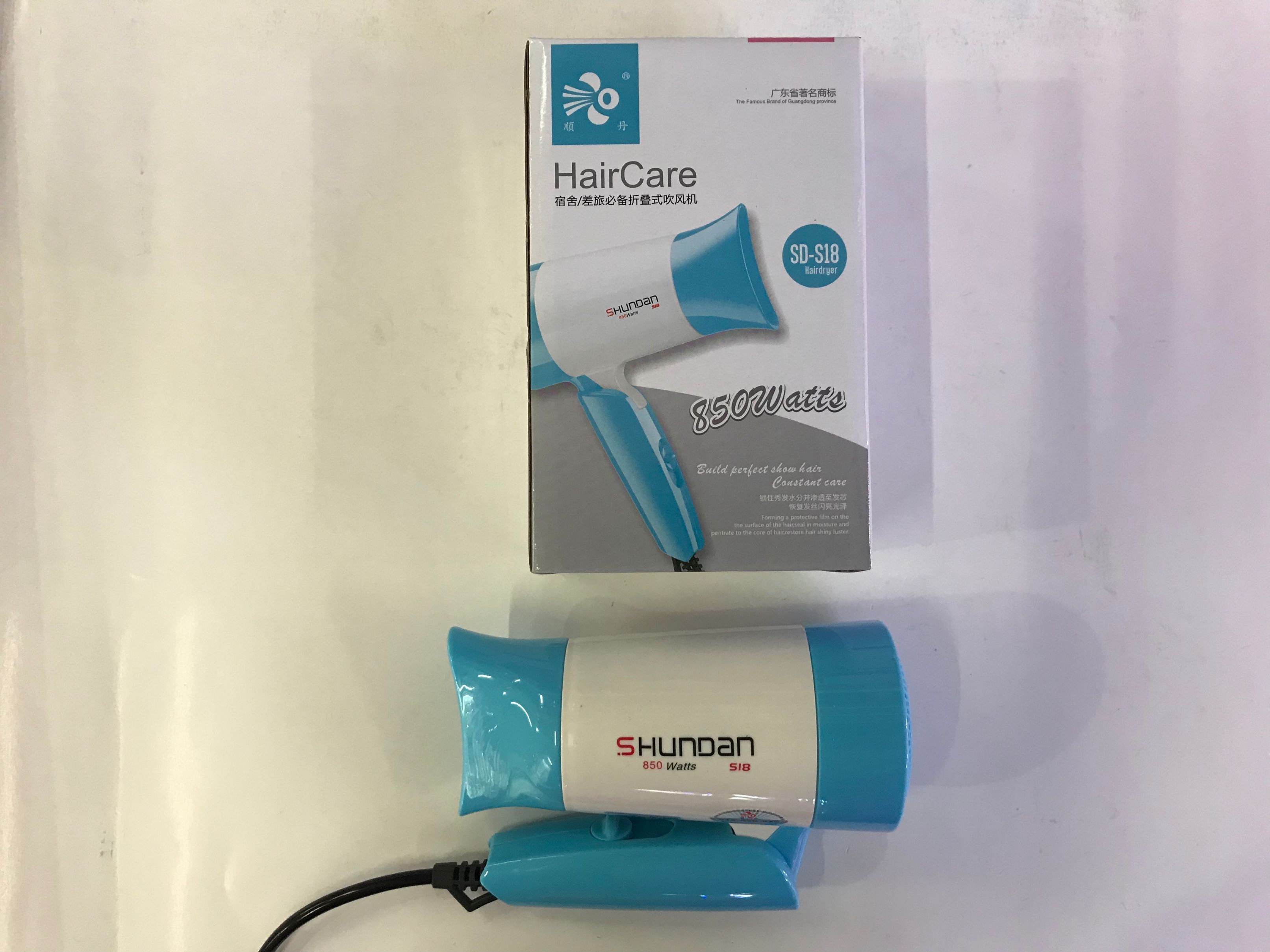 The folding travel hair dryer is convenient to carry