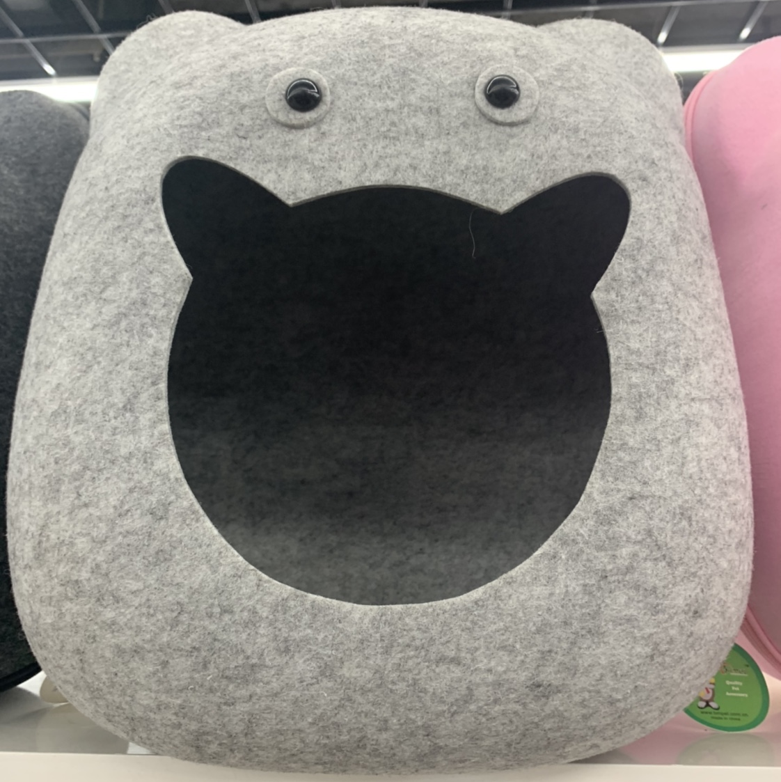 Tall grey cat-shaped open pet bed