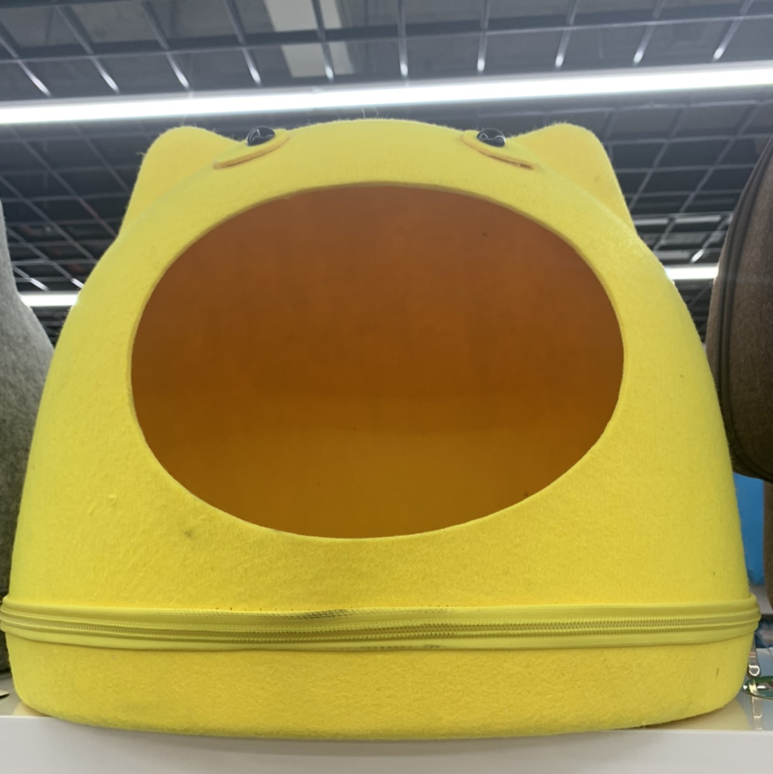 Yellow circular opening pet bed