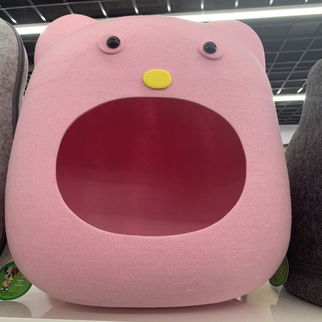 Pink oval-shaped open pet bed