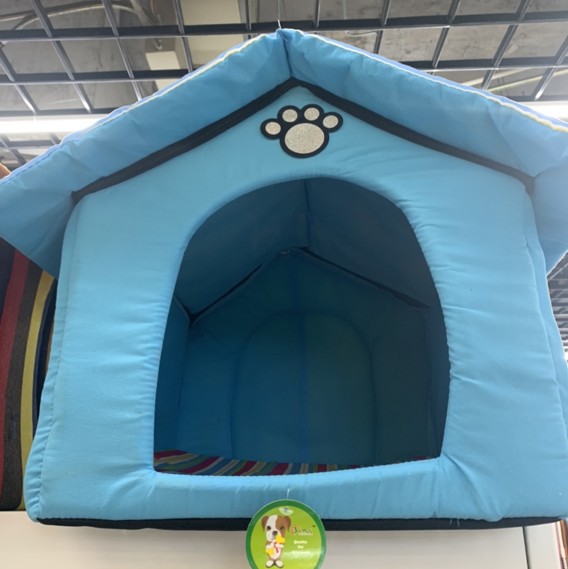 A solid blue pet bed