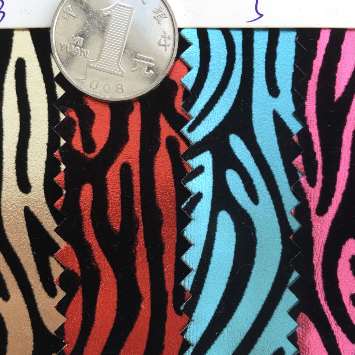 Flocking leather. Zebra-patterned leather bags, leather goods and shoes. Direct sales of artificial leather from jewelry manufacturers