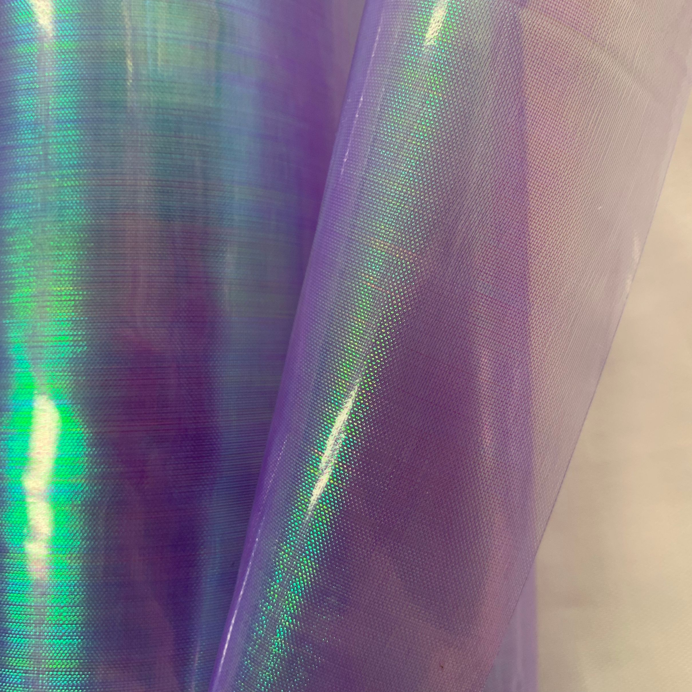 EVA幻彩丝夹网布系列化妆包笔袋材料膜