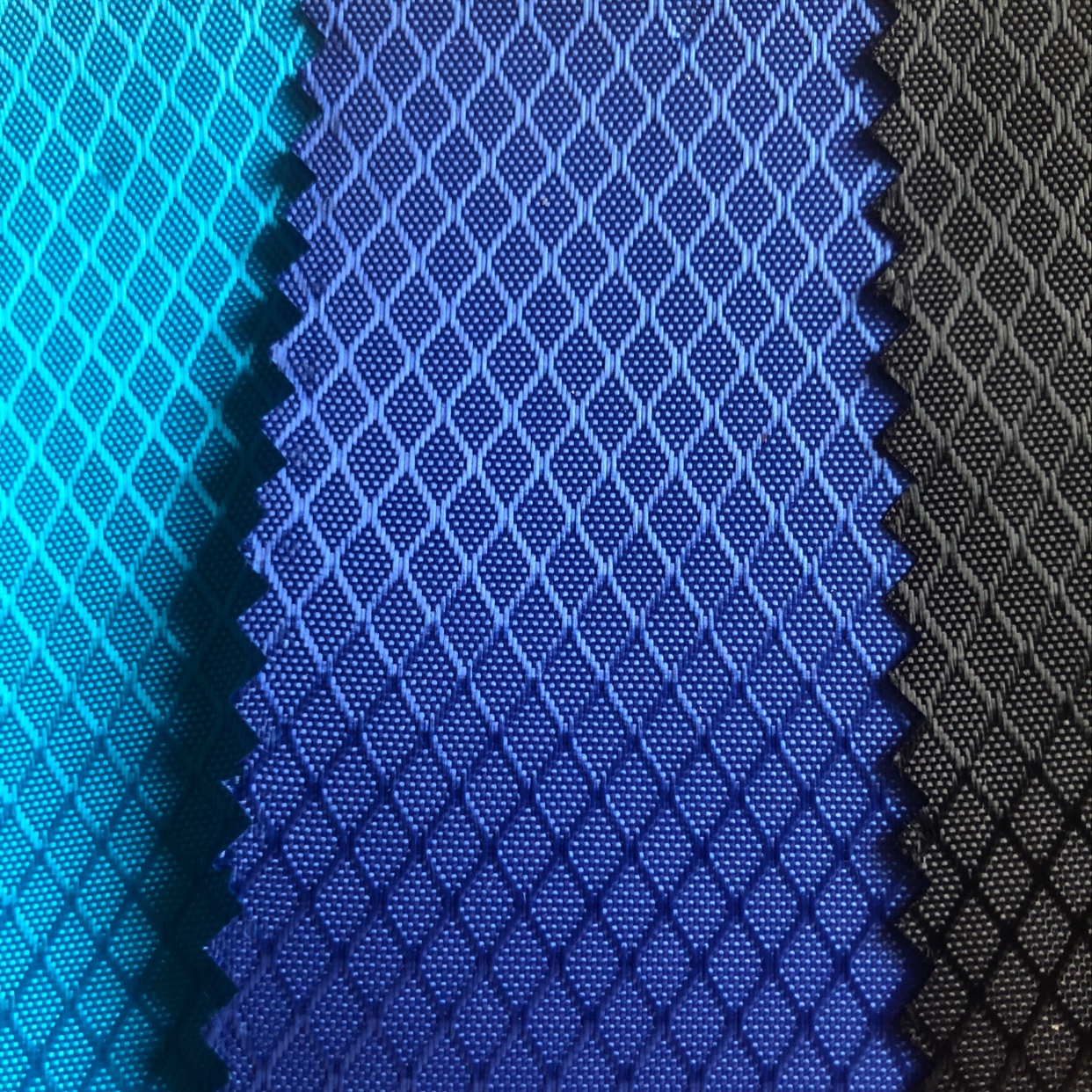 厂家直销热销新款210d菱形格pu 宝蓝0.3长丝有光菱形格子牛津布 箱包手袋提花面料 皮革大量现货各种高中档箱包面料