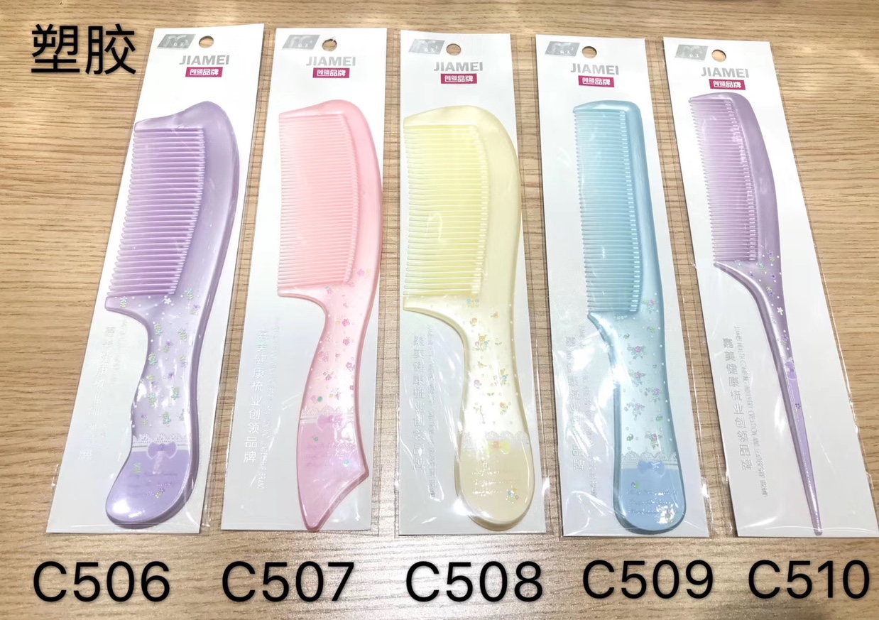 Close-up of textured grip and ergonomic shape of 3D comb