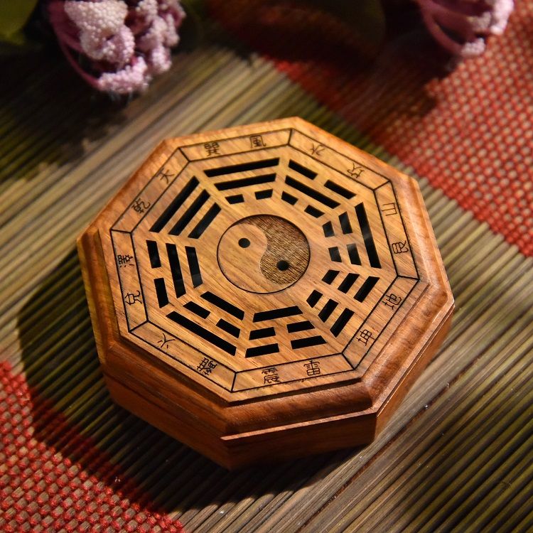 A round and flat incense burner made of rosewood detail image 10