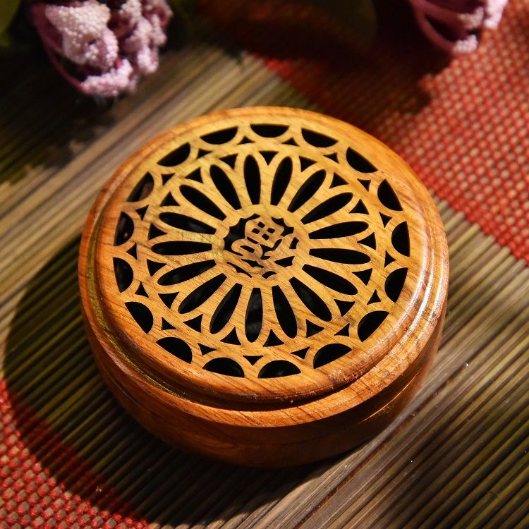 A round and flat incense burner made of rosewood detail image 6