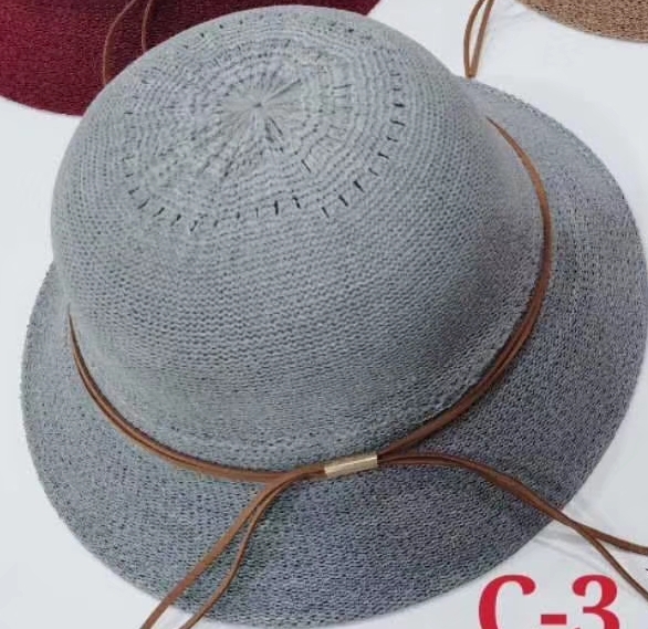 A casual hat with knitted buttons thumbnail