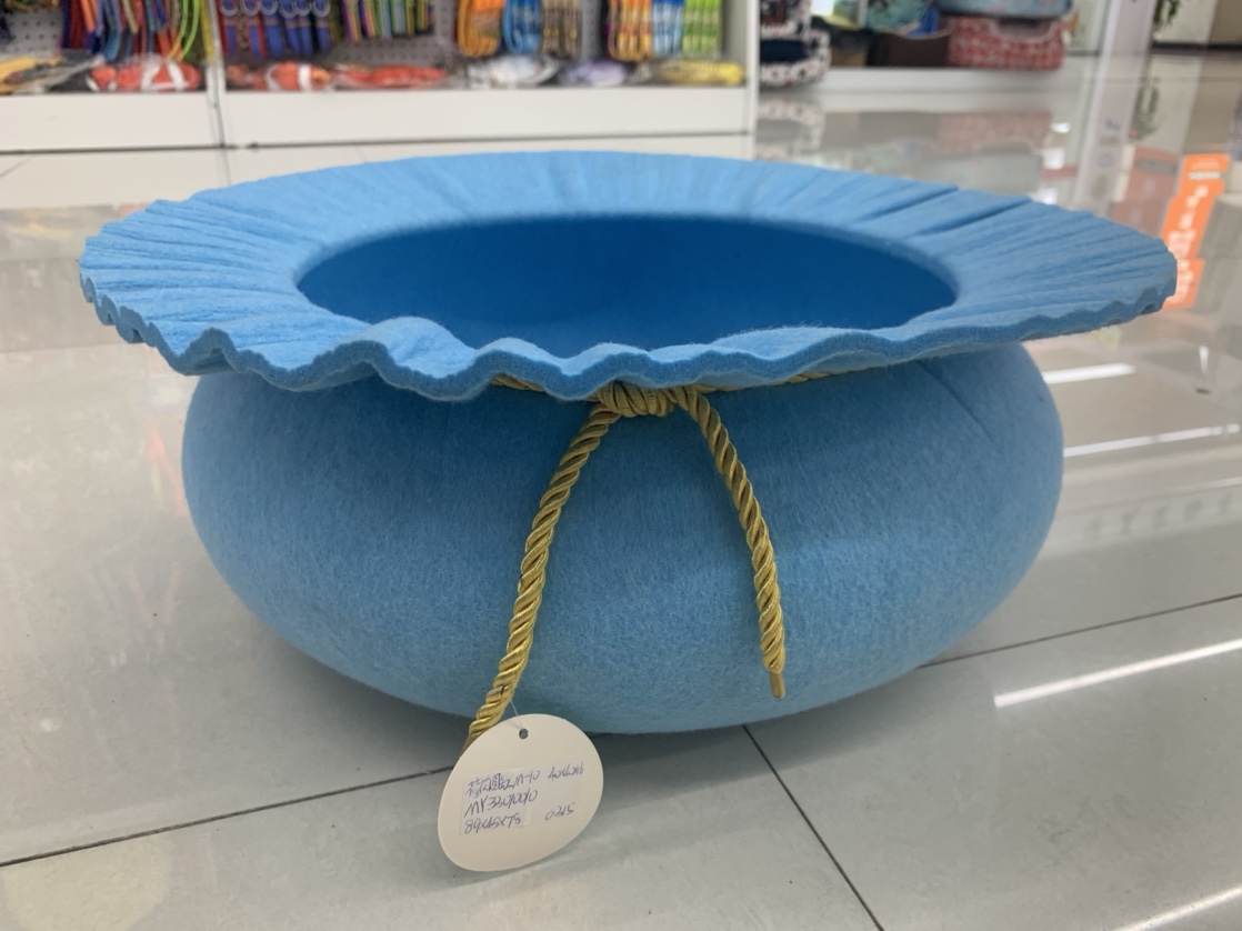 A large blue round pet bed