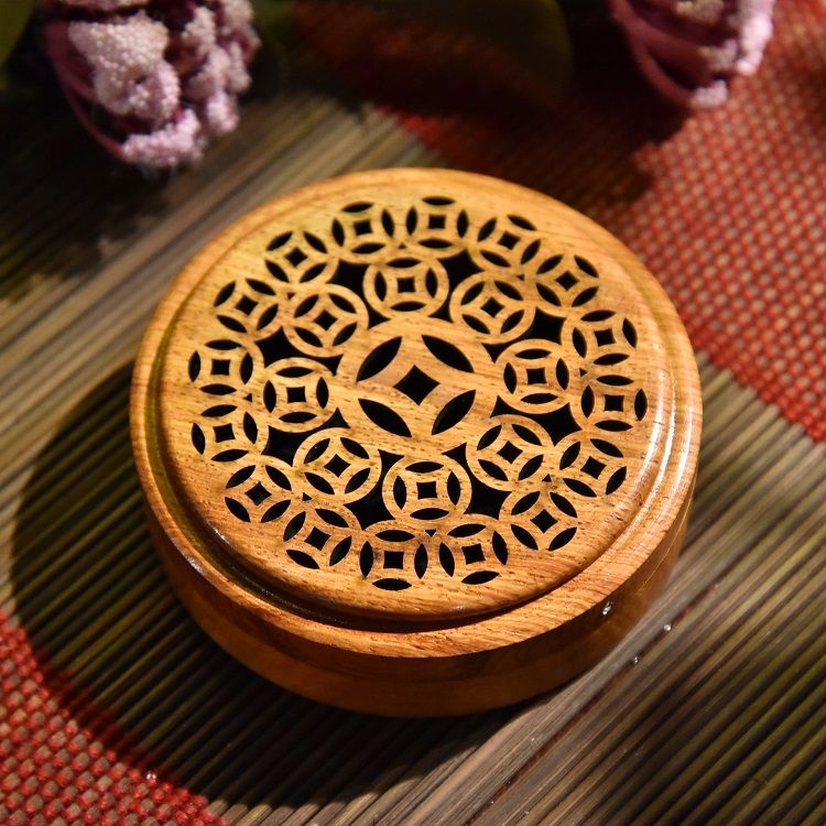 A round and flat incense burner made of rosewood detail image 9