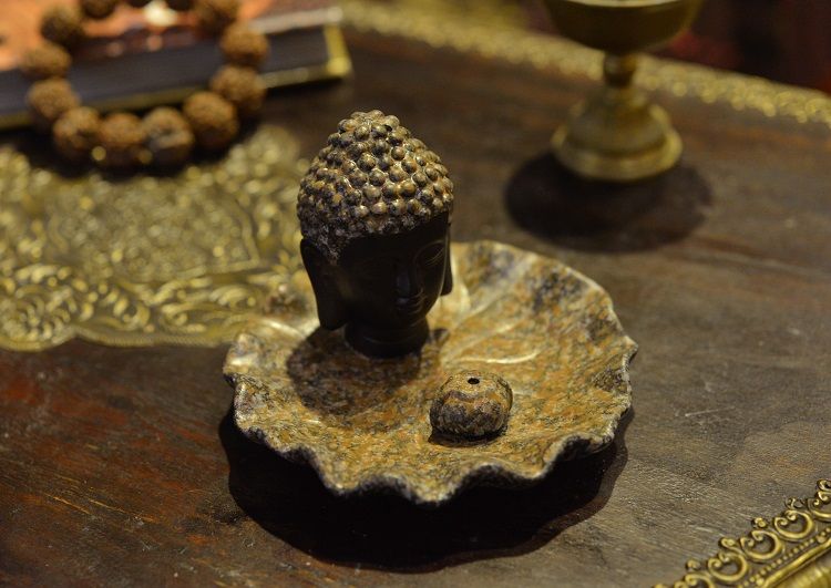 Buddha's head incense burner