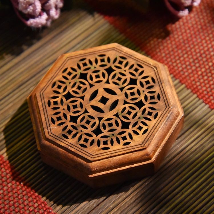 A round and flat incense burner made of rosewood detail image 5