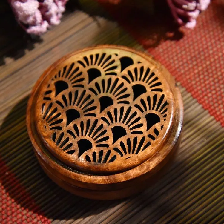 A round and flat incense burner made of rosewood detail image 2
