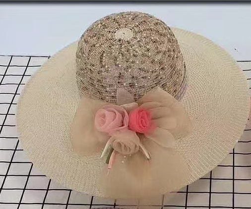 Two - colour knitted bonnet