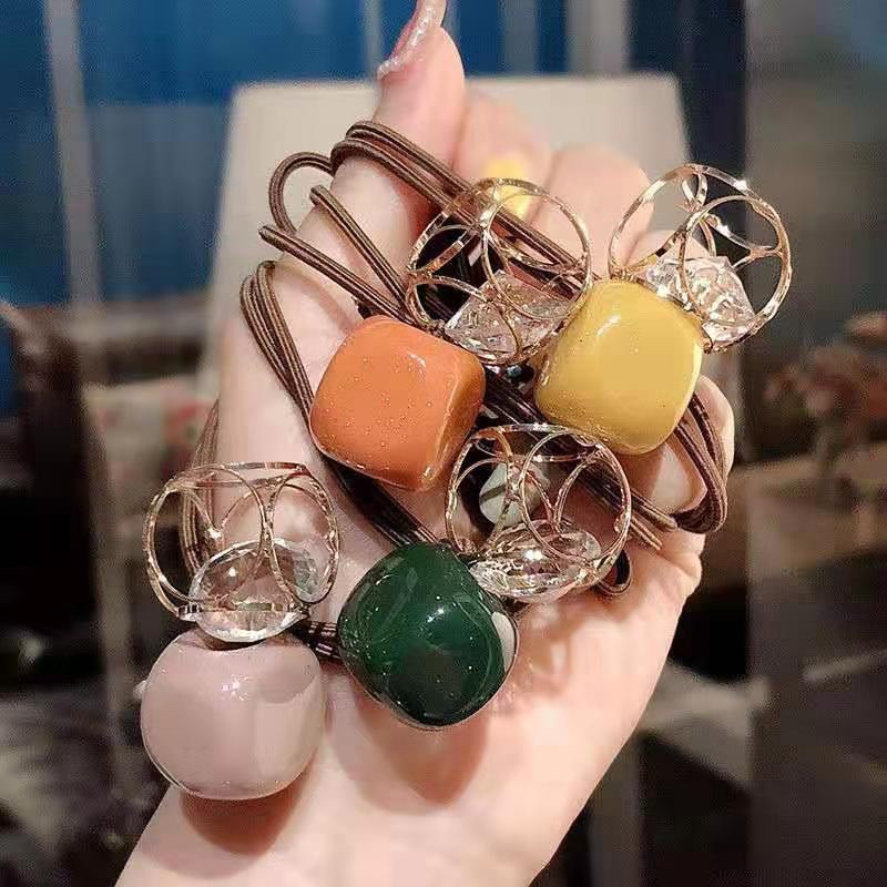 Empty balls of ten square beads