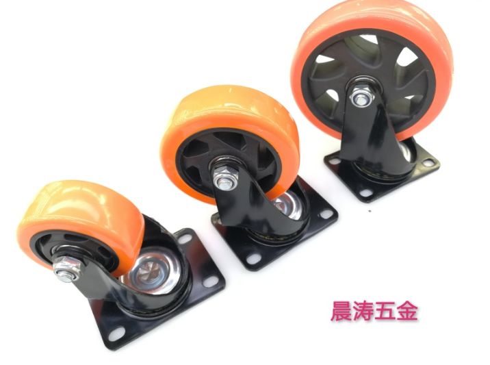 4 "medium orange face black core black frame biaxial flat bottom casters thumbnail