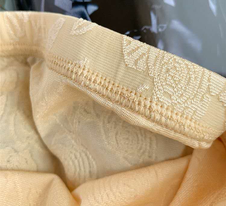 The Internet has gone viral with ice silk nylon jacquard lace edge summer anti-exposure, fat and plus-size mid-high-waisted safety pants detail image 9