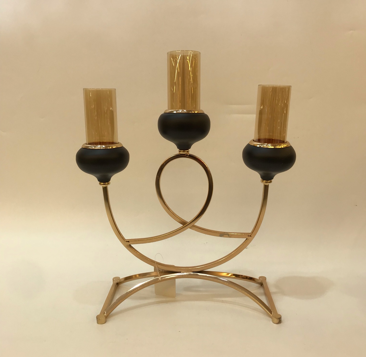 Three black candlesticks