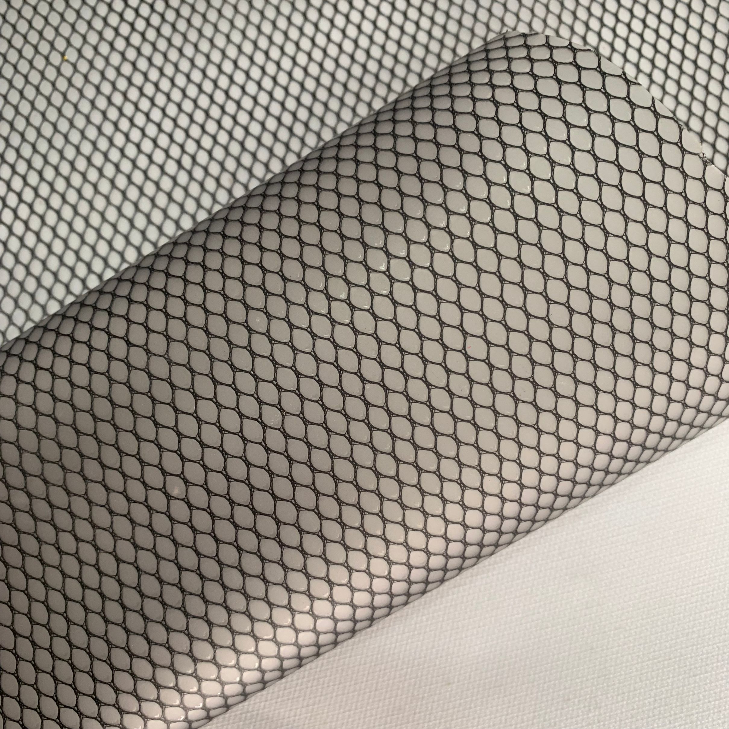 六角网环保EVA PEVA夹网布洗漱包材料膜详情图6