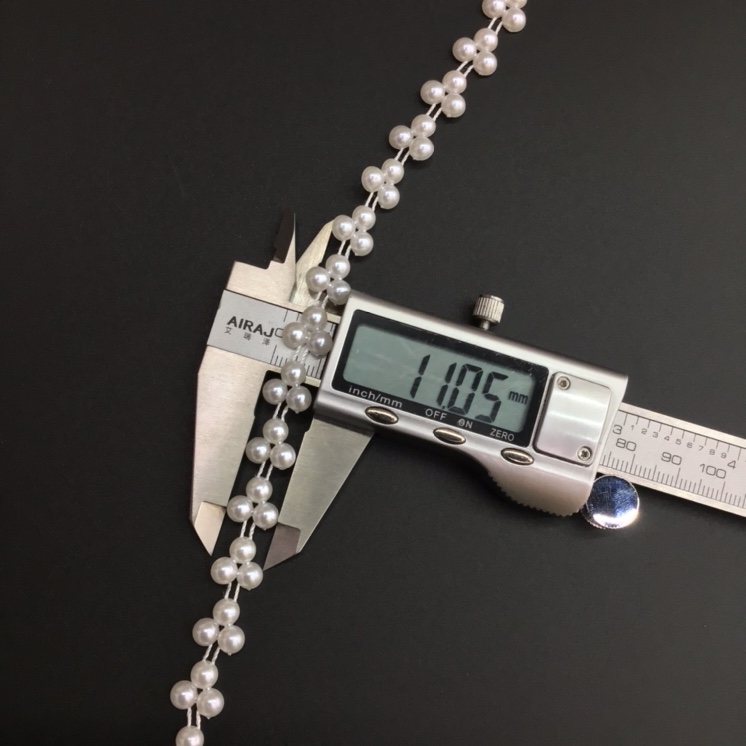 Wholesale of 6mmABS triangular bead handcrafted DIY headwear, wedding dress, skirt and garment accessories, handicrafts and accessories Application Scenario