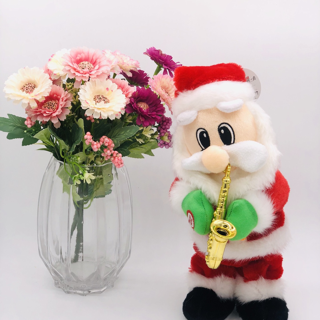 Factory direct sales of new genuine Christmas saxophone playing old man small electric toys for the elderly