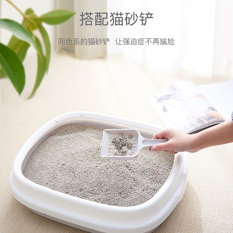 The semi-enclosed pet cat litter box can be detachable to prevent splashing of cat feces. The cat toilet comes with a cat litter shovel undefined