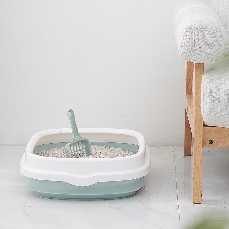 The semi-enclosed pet cat litter box can be detachable to prevent splashing of cat feces. The cat toilet comes with a cat litter shovel undefined