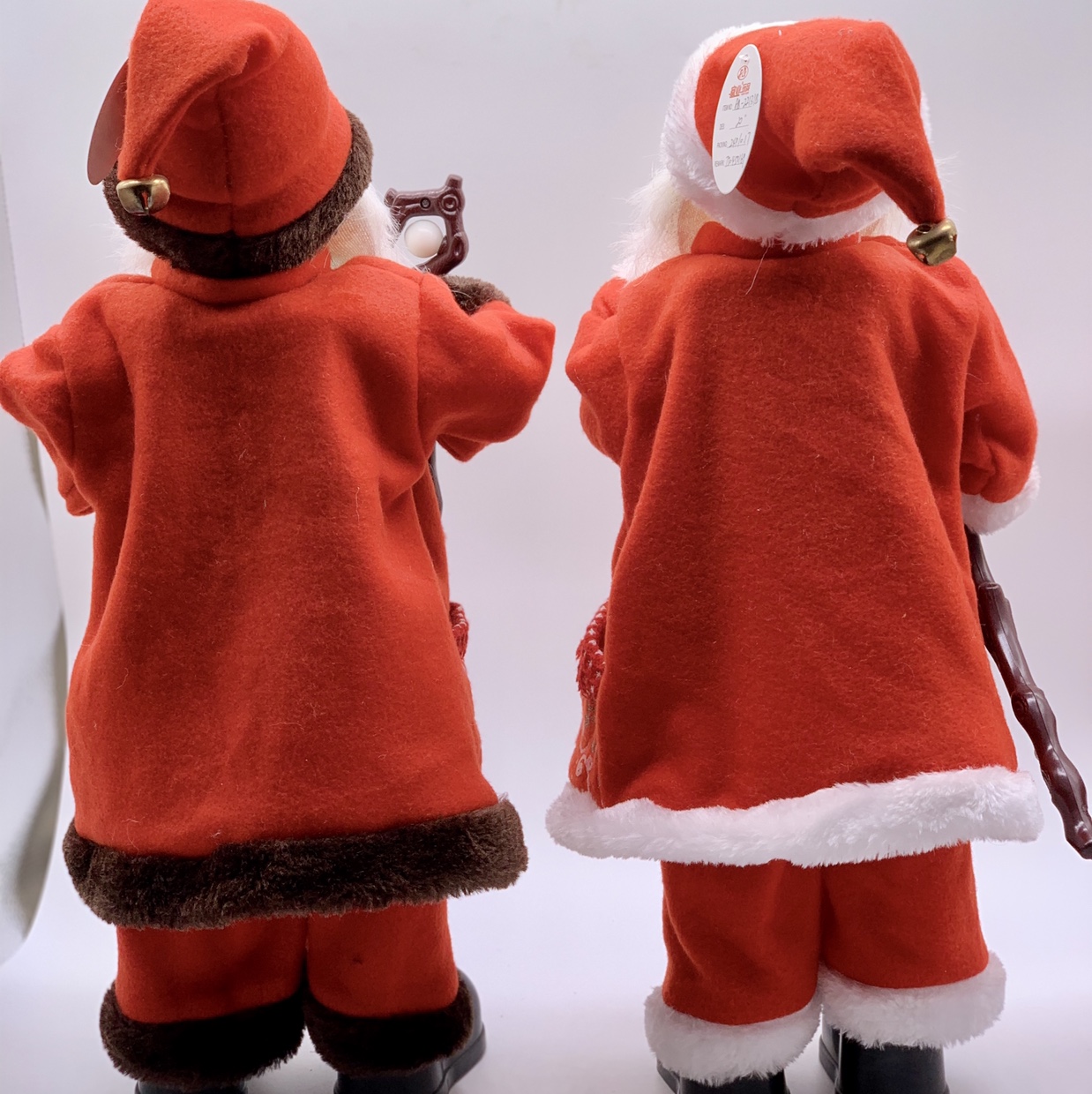 A 50-centimeter-tall Santa Claus holding a cane details Picture