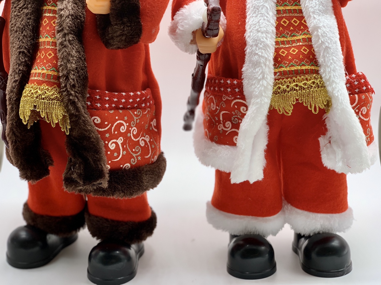 A 50-centimeter-tall Santa Claus holding a cane undefined