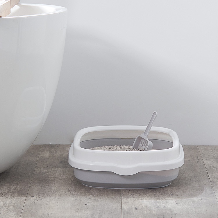 The semi-enclosed pet cat litter box can be detachable to prevent splashing of cat feces. The cat toilet comes with a cat litter shovel undefined