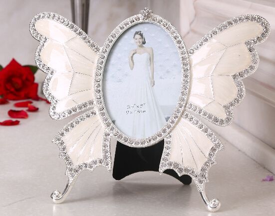 定做相框  相框厂家  滴油相框  小马相框 金属相框 蝴蝶相框产品图