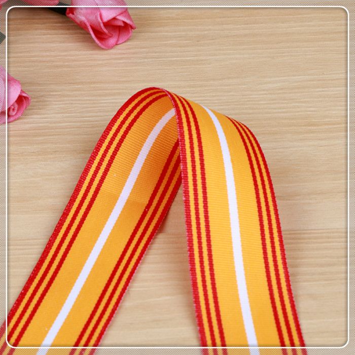 Factory direct sales of 2.5cm yellow-red polyester webbing, medal straps, lifting straps, mobile phone lifting straps, and clothing accessories can be processed Application Scenario