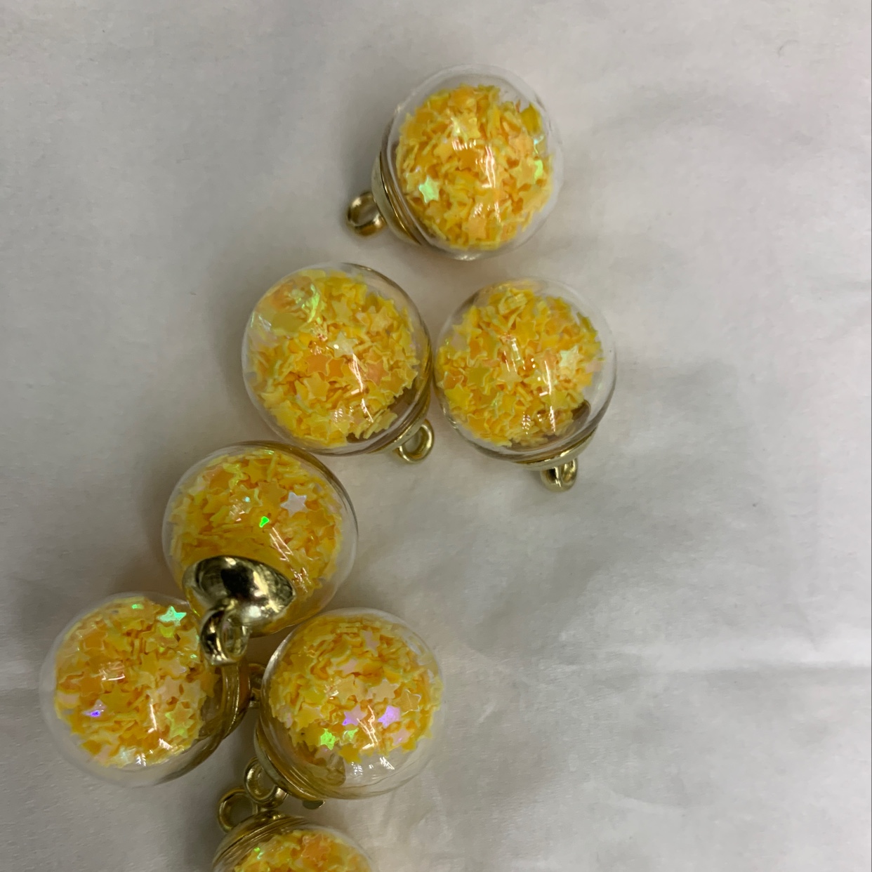 Lemon yellow star in glass bottle thumbnail
