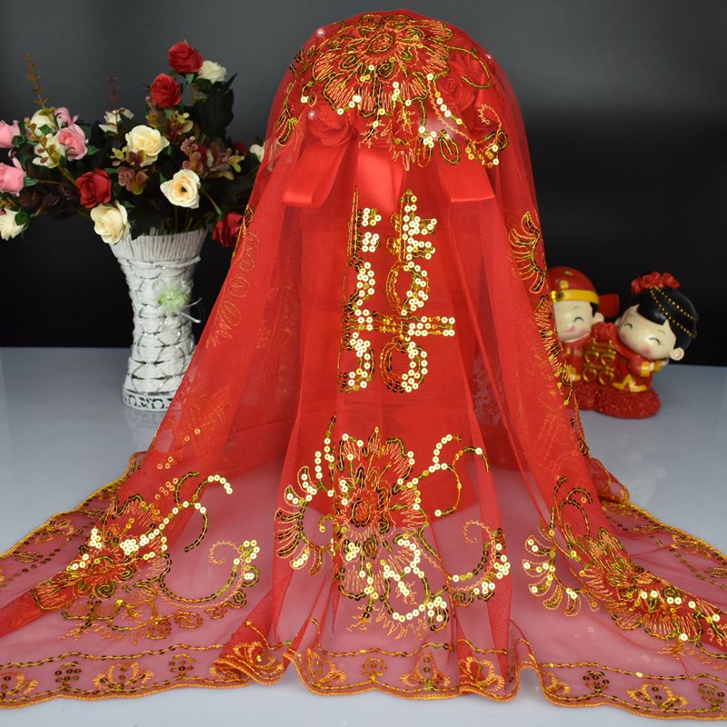 A golden bride's veil with the character "Prosperity and Happiness" for the wedding