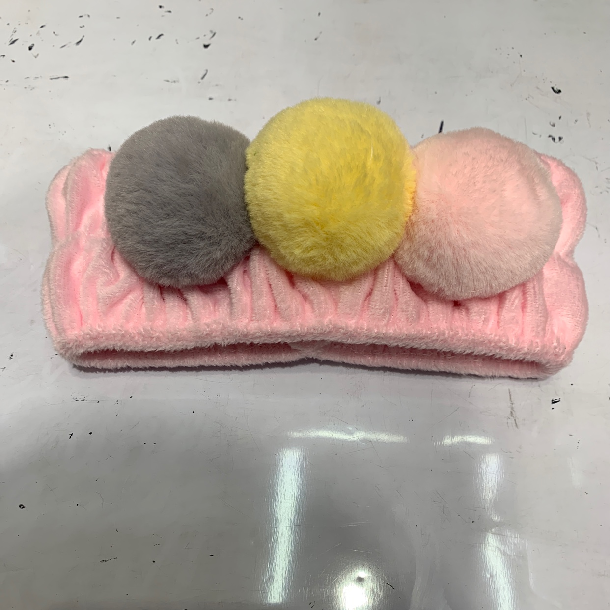 A popular pom-pom hair band