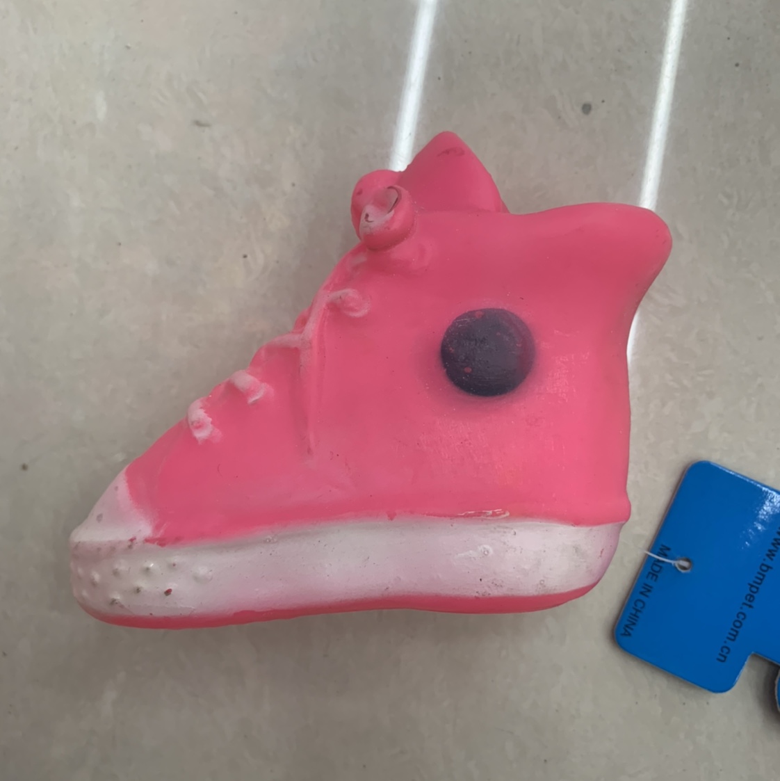 Pet toys with white soles and pink small shoes
