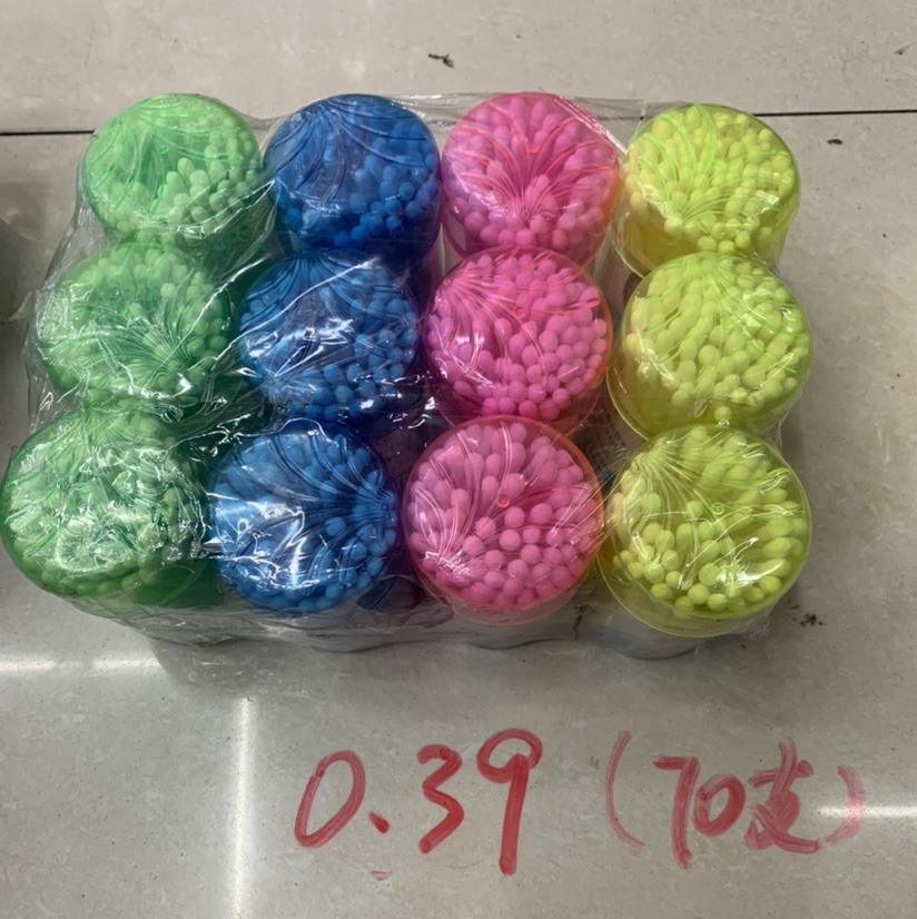 The little girl uses cotton swabs