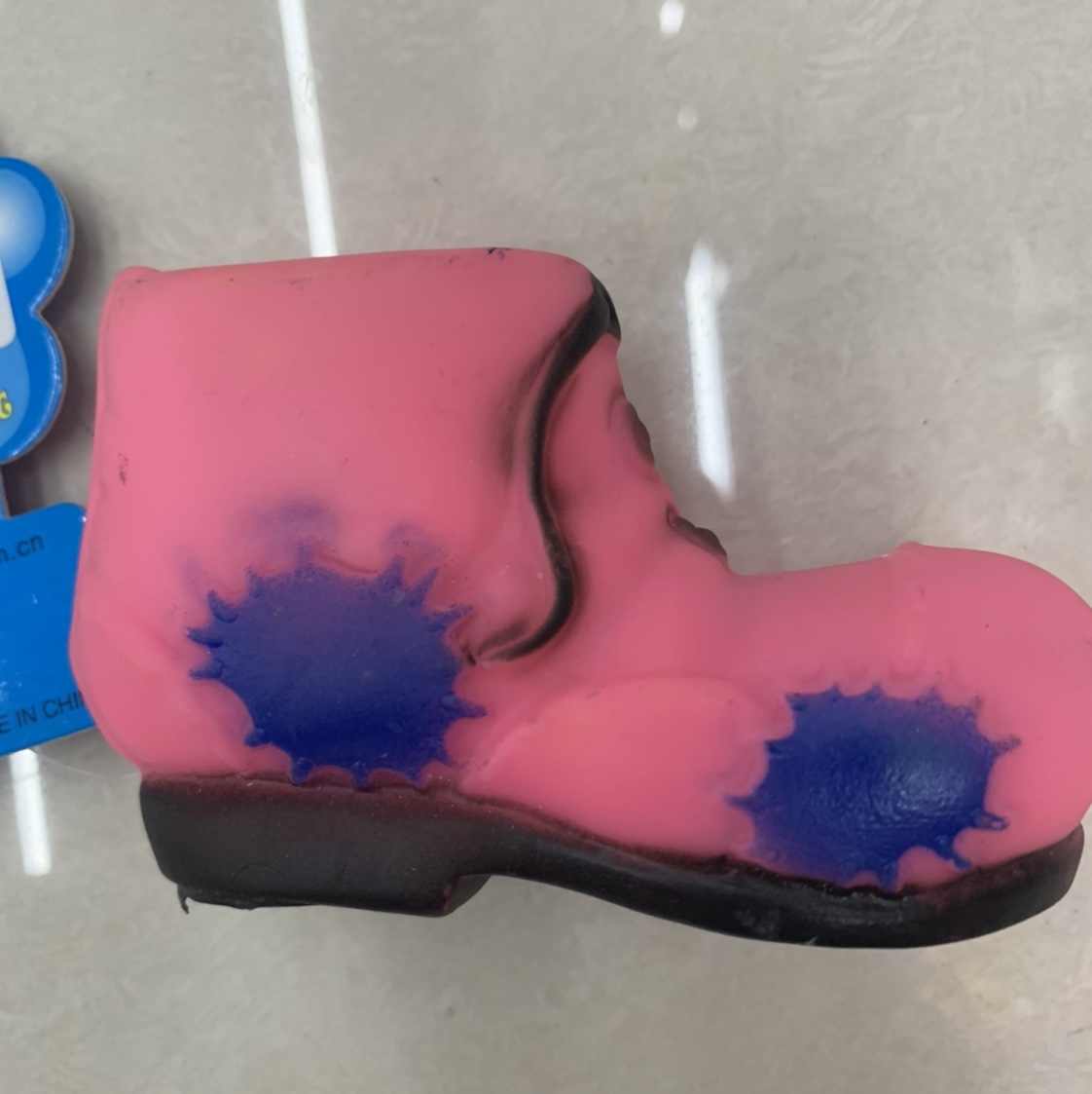 Blue graffiti, pink shoes, pet toys