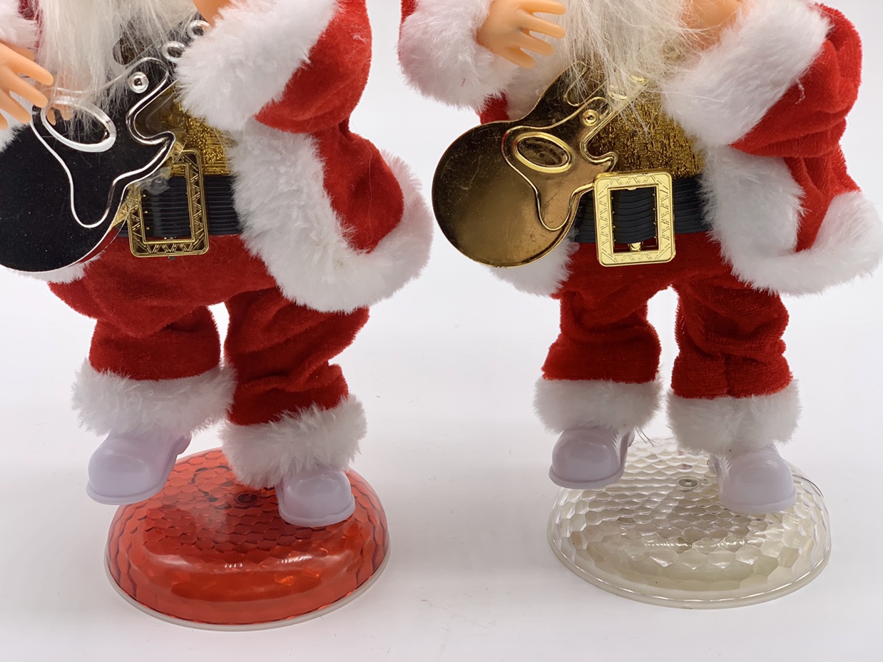 A 30-centimeter rotating guitar dancing Santa Claus undefined