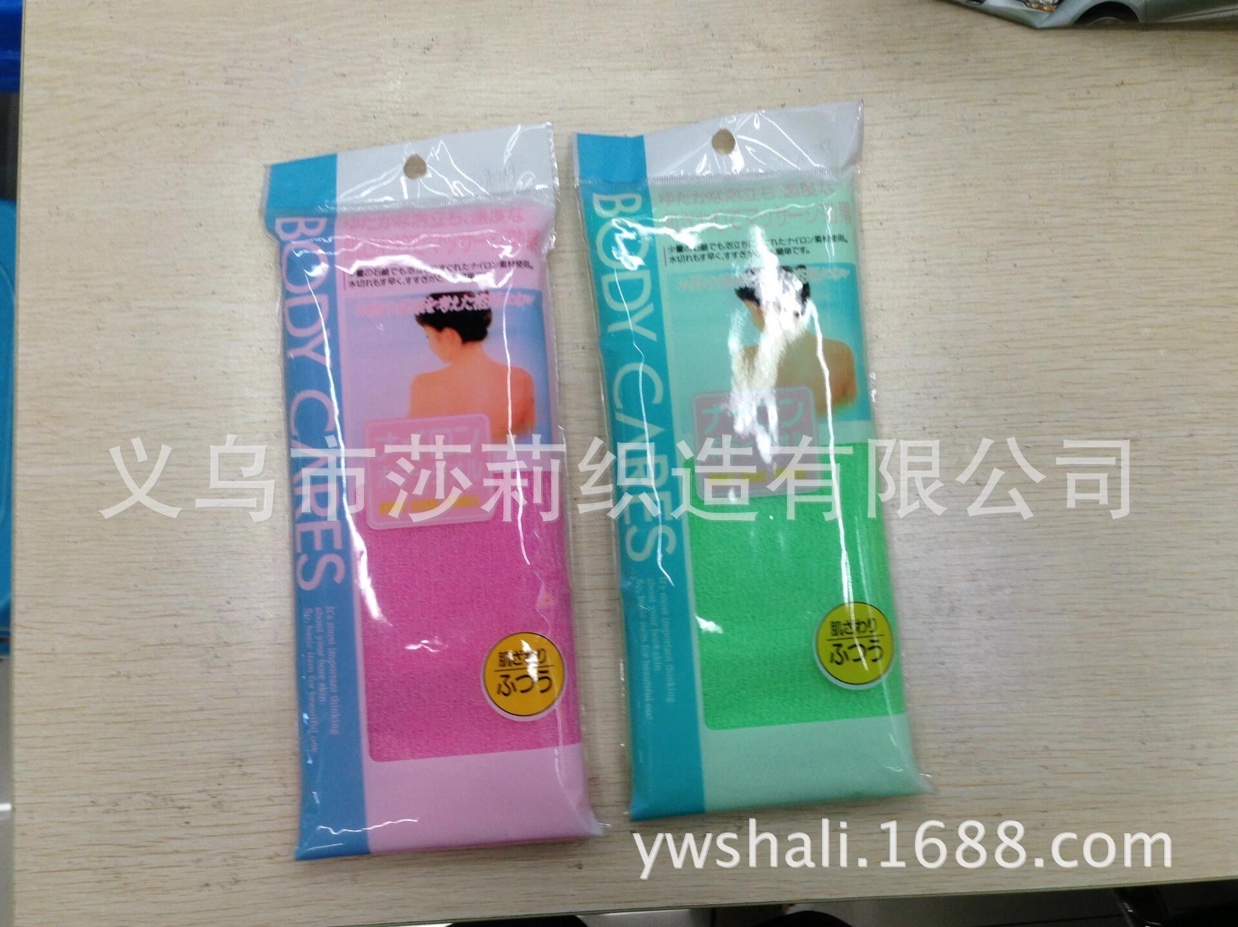 厂家直销能够快速去除污垢，深层护理肌肤的高档桑拿巾，洗澡巾白底实物图