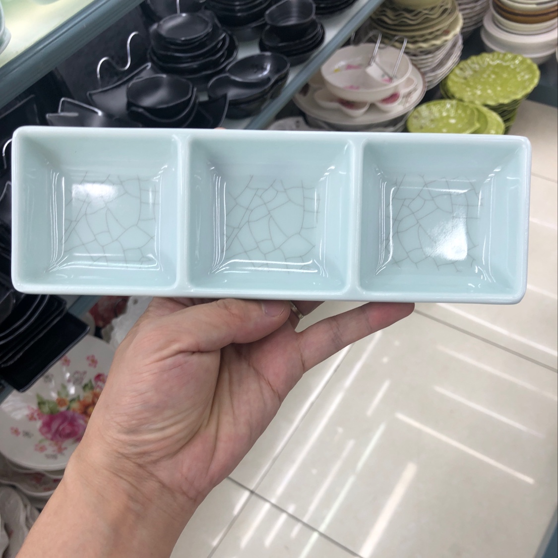 A three-compartment ice-cracked dish