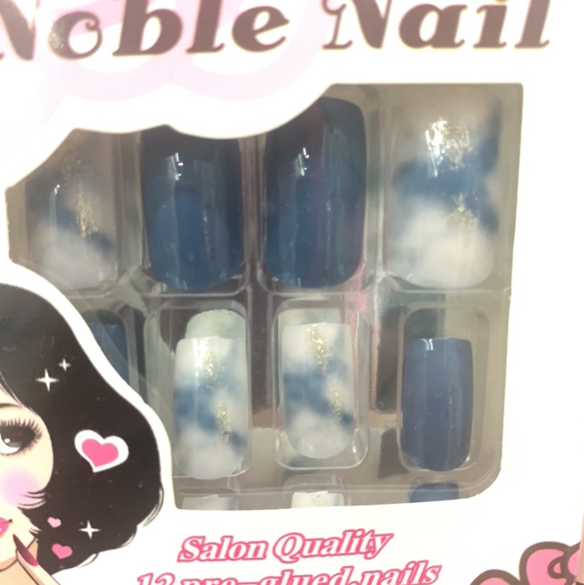 Blue tinted manicure