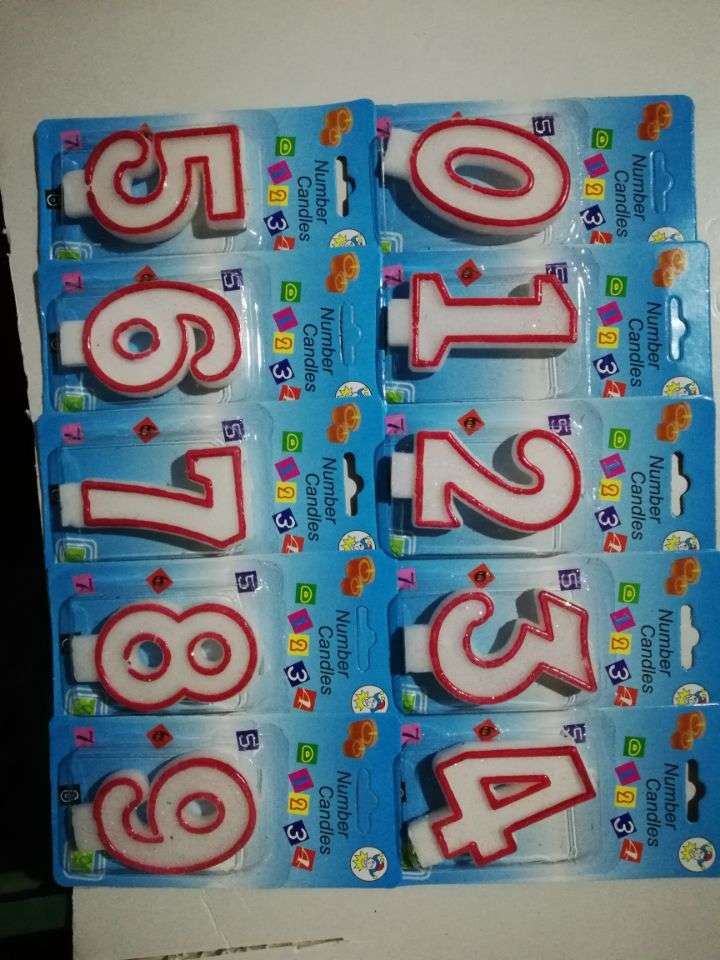 Upscale birthday cakes decorated with red and white numbers full figure