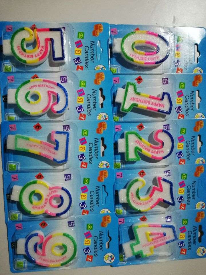 Upscale birthday cakes decorated with red, blue and white numbers full figure