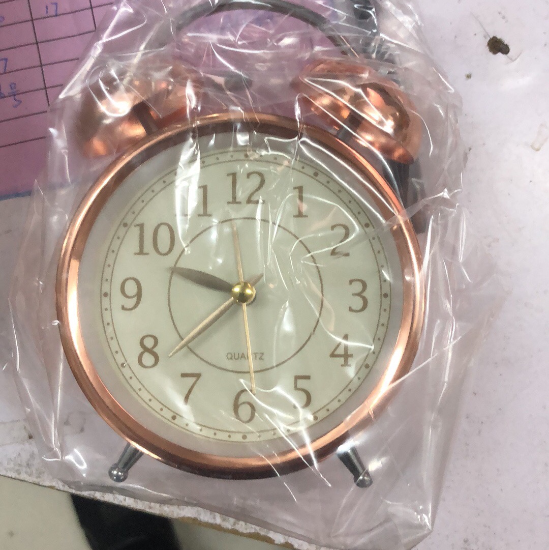 Golden alarm clock details Picture
